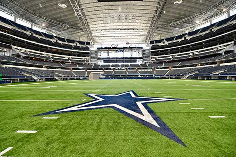 Wide view of the football field inside AT&T Stadium
