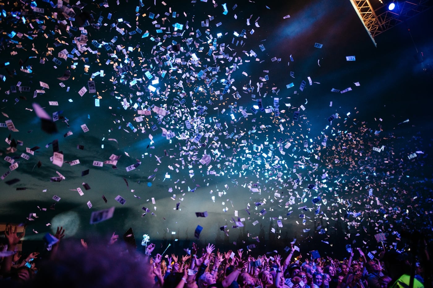 Concert crowd with confetti at an outdoor event