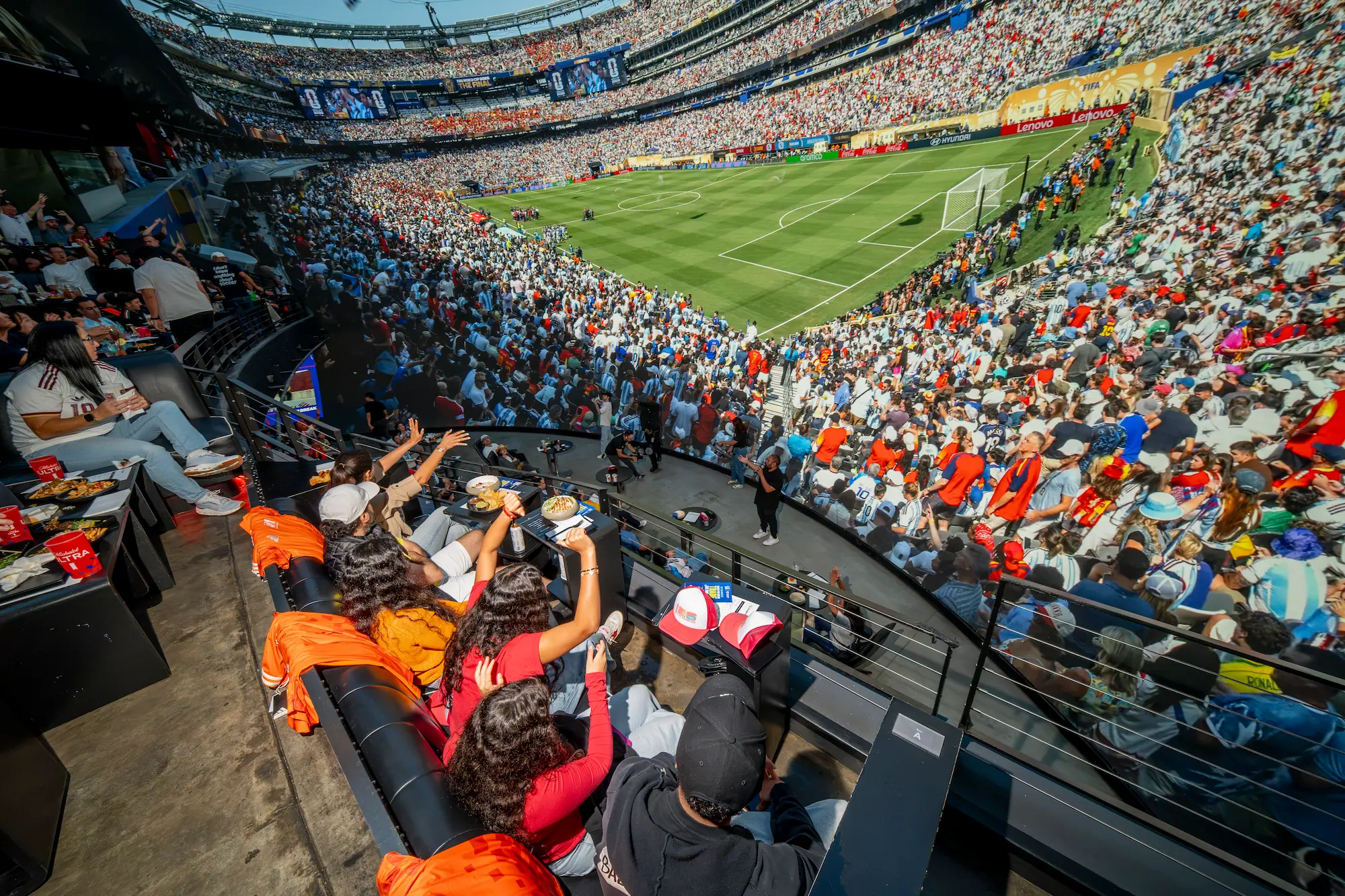 Fans cheering at a World Cup final at Cosm