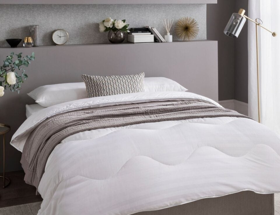 Boutique Silk duvet styled on a bed
