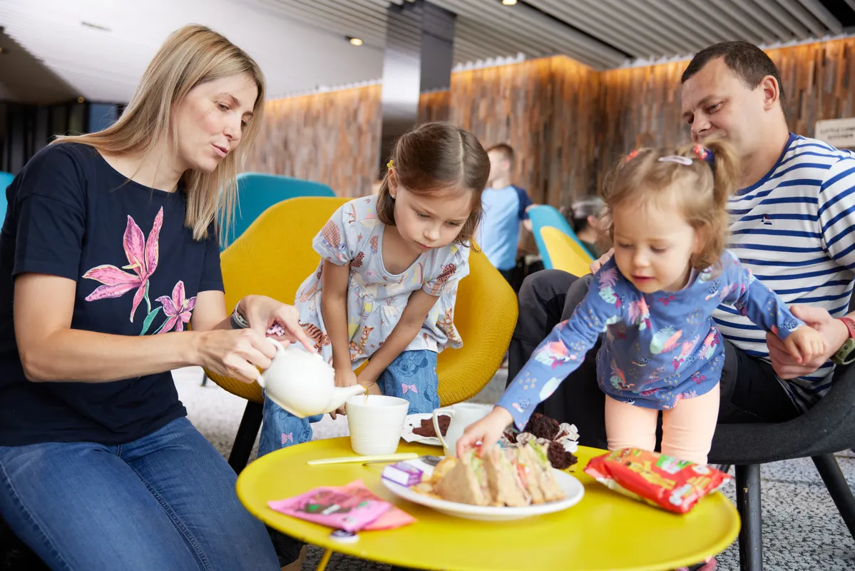 Family eating in a cafe at Lowry