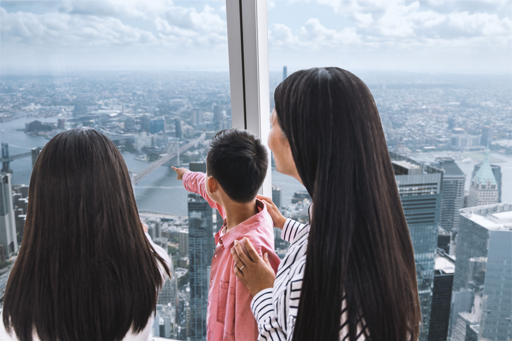 A family enjoying a view at One World Observatory