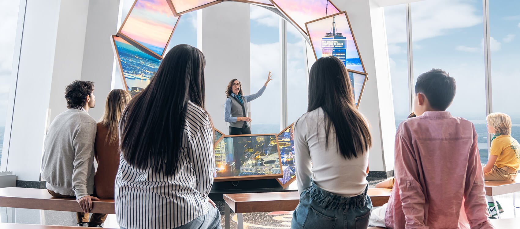 Visitors enjoying a group experience at One World Observatory