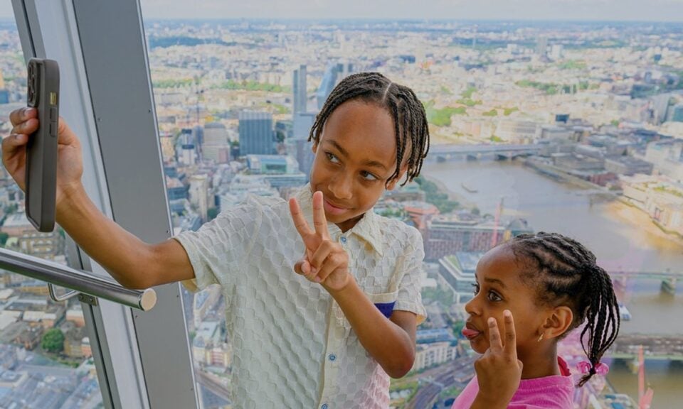 Family enjoying a bright summer visit at The View from The Shard