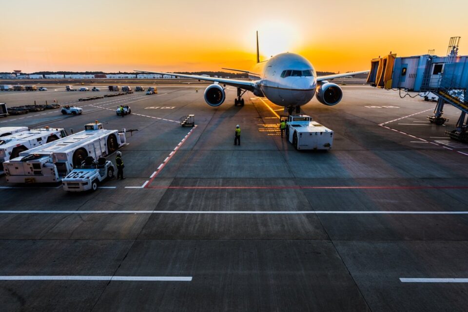 Airplane parked at an airport gate
