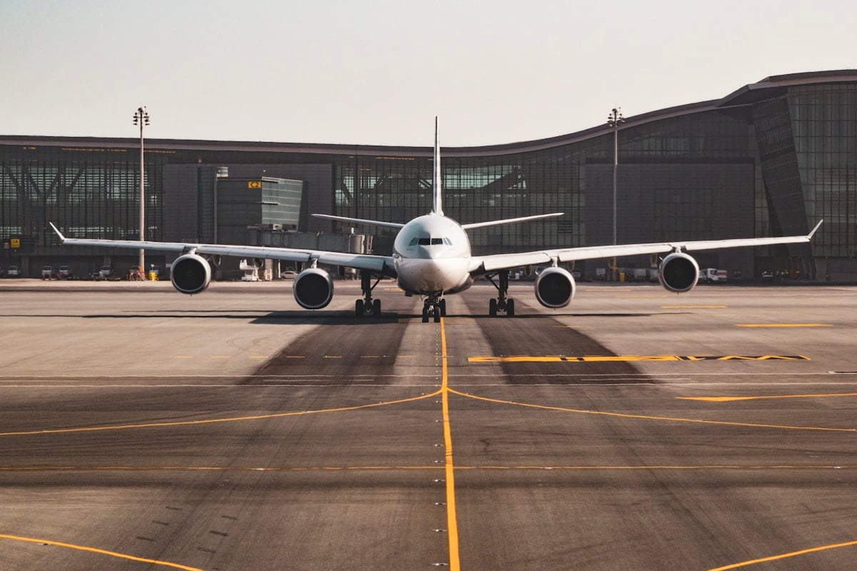 Airplane parked on an airport tarmac