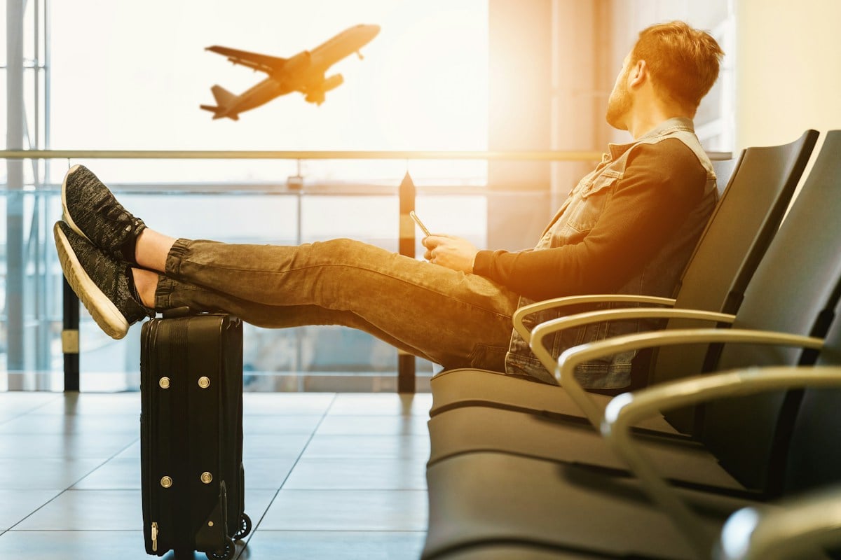 Traveller waiting inside an airport