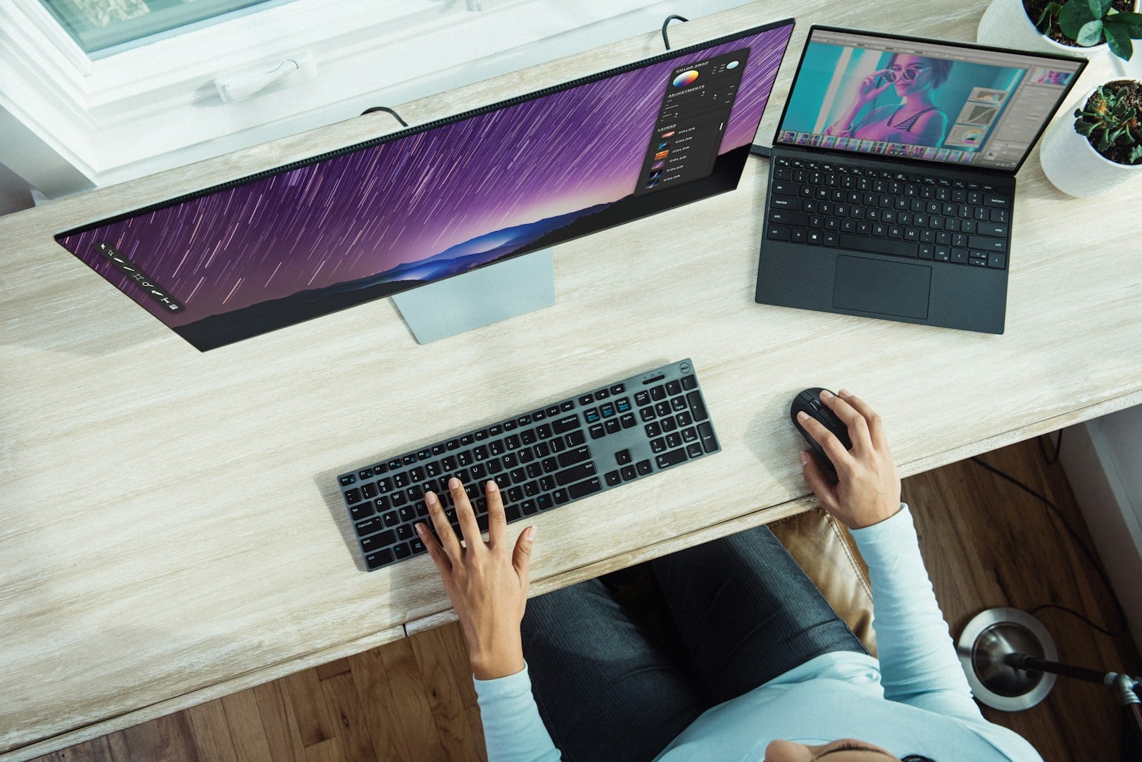 Desk with monitors and keyboard
