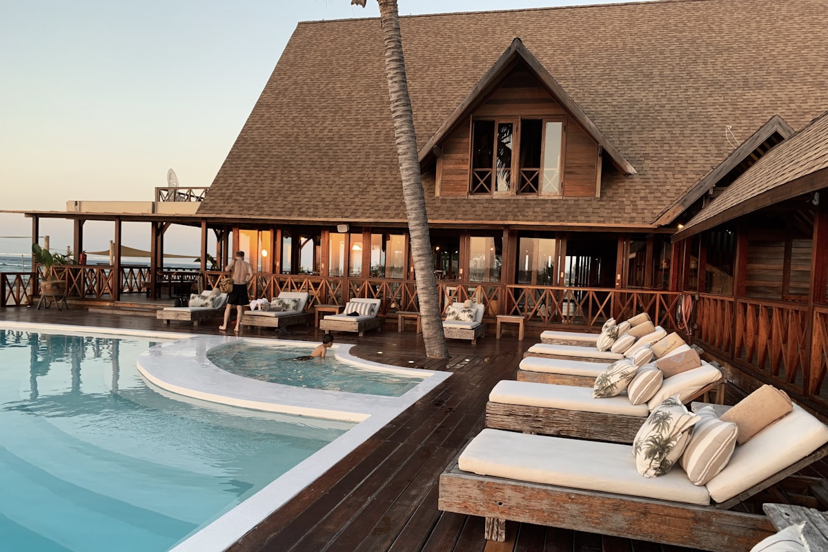 Outdoor resort swimming pool with loungers