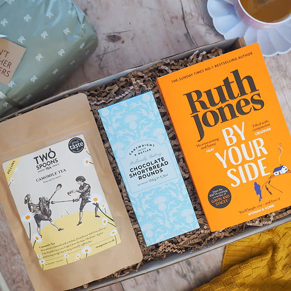 Get Well Soon gift box with a book and treats