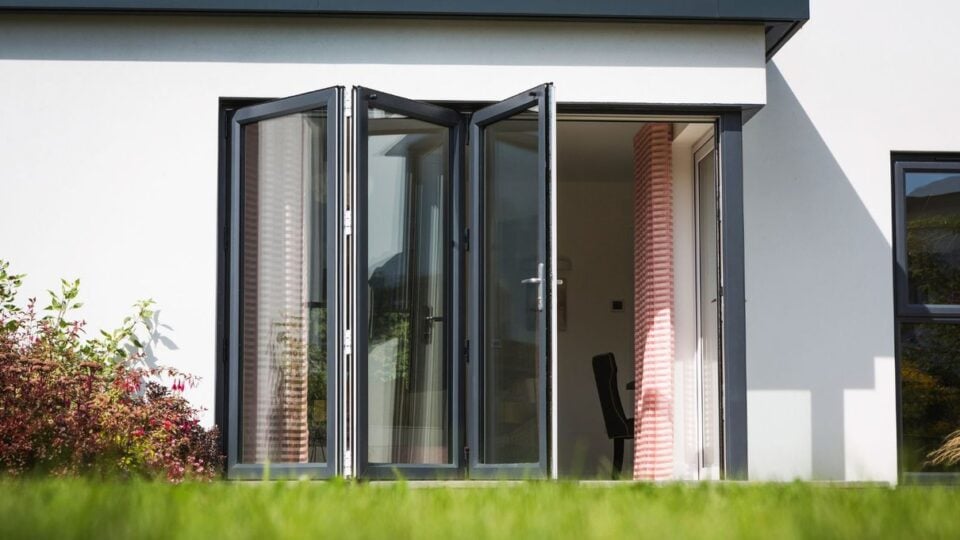 Eurocell Aspect uPVC bi-fold doors opening onto a garden