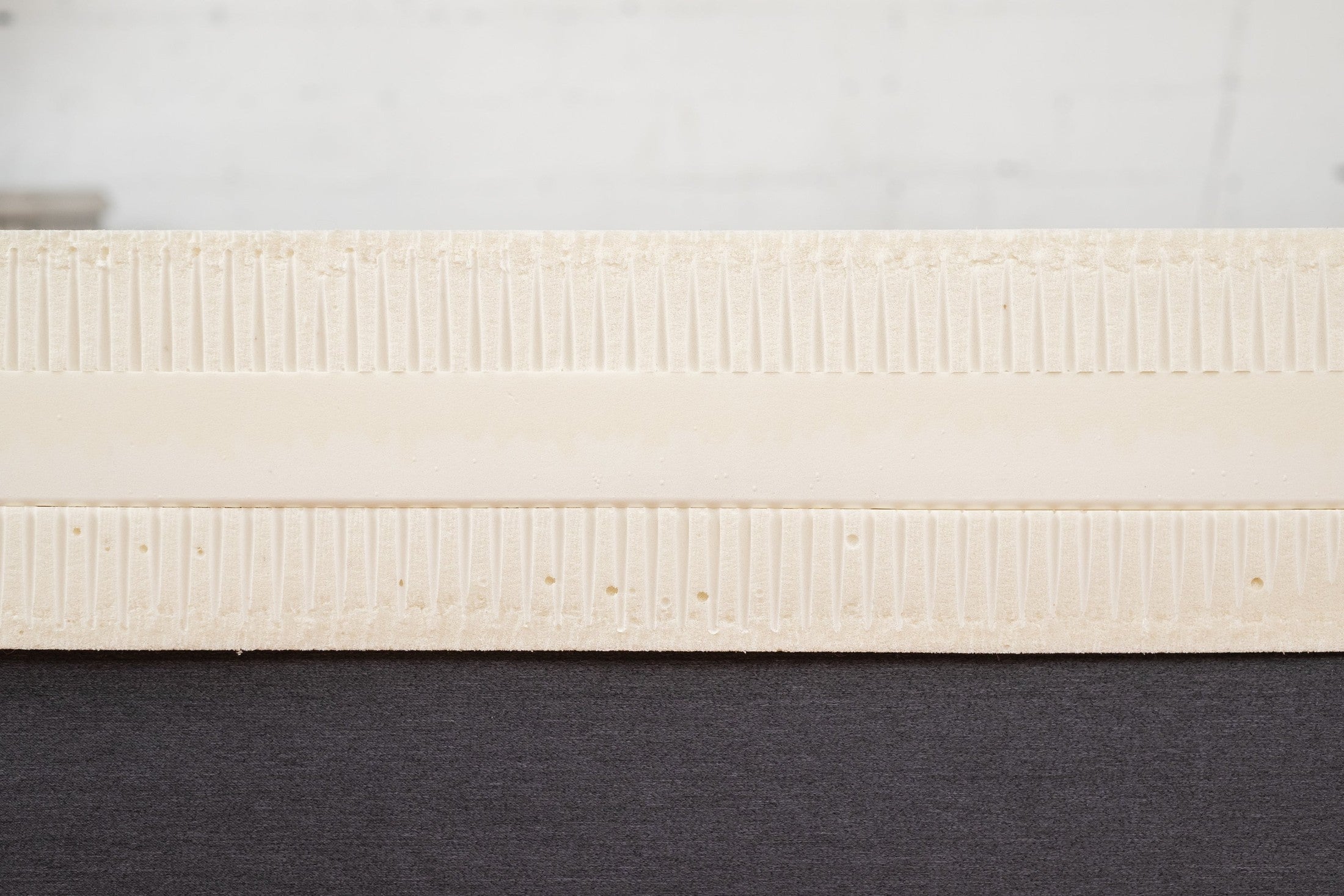 Cross-section showing latex foam layers