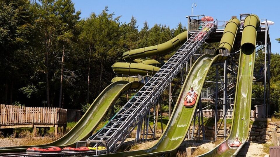 Visitors enjoying rides at Lightwater Valley Family Adventure Park