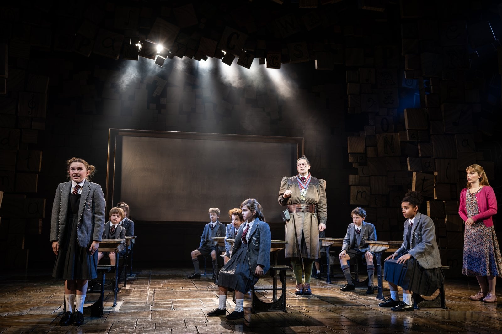 Matilda The Musical performers in a classroom scene