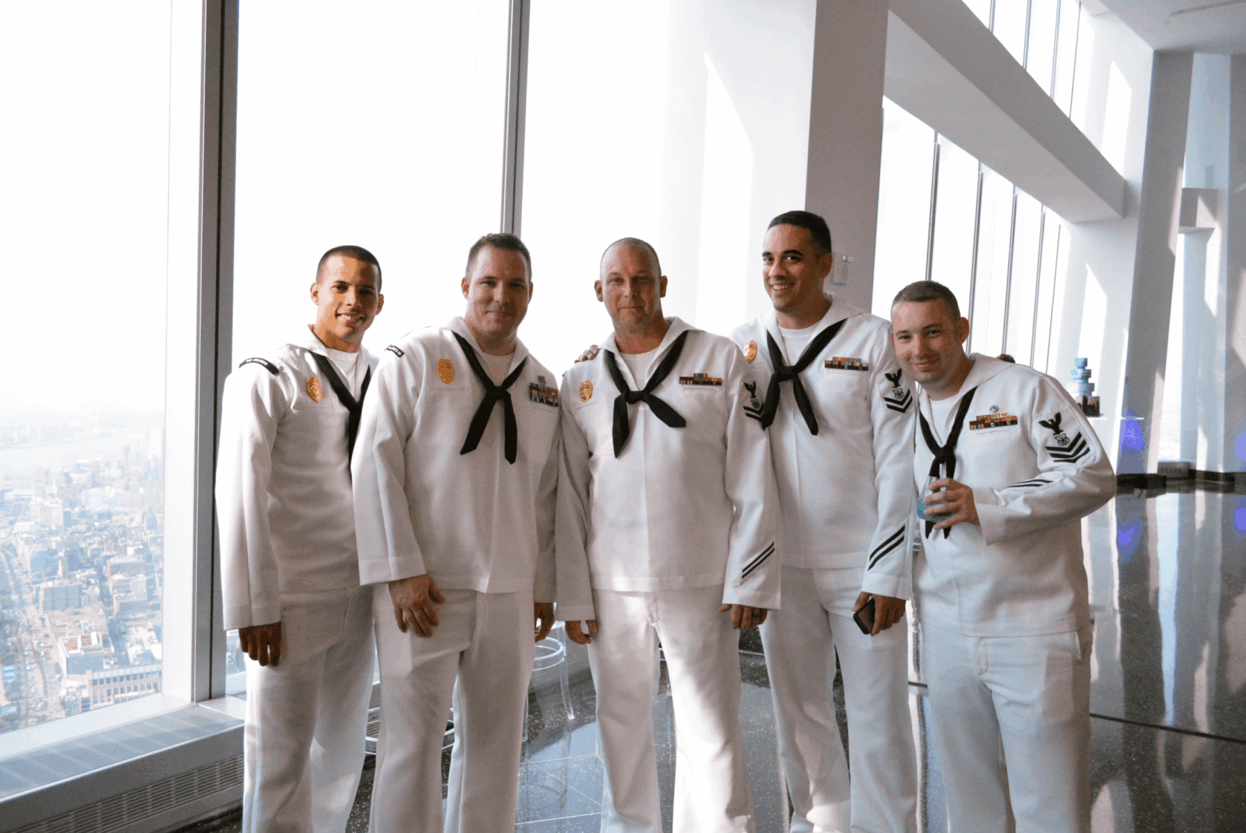 Sailors posing indoors at One World Observatory