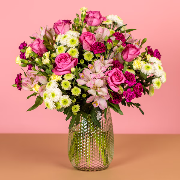 Loving Embrace bouquet with pink roses and mixed flowers