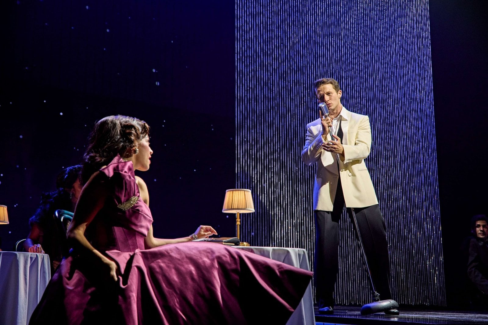 Cast members in a live Sinatra the Musical performance