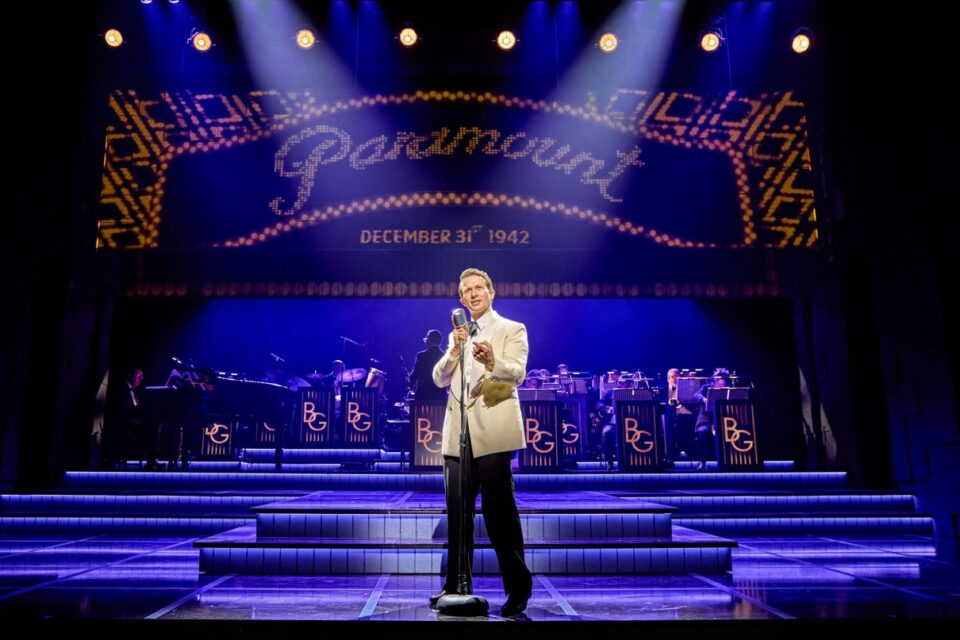 Actors performing a scene from Sinatra the Musical
