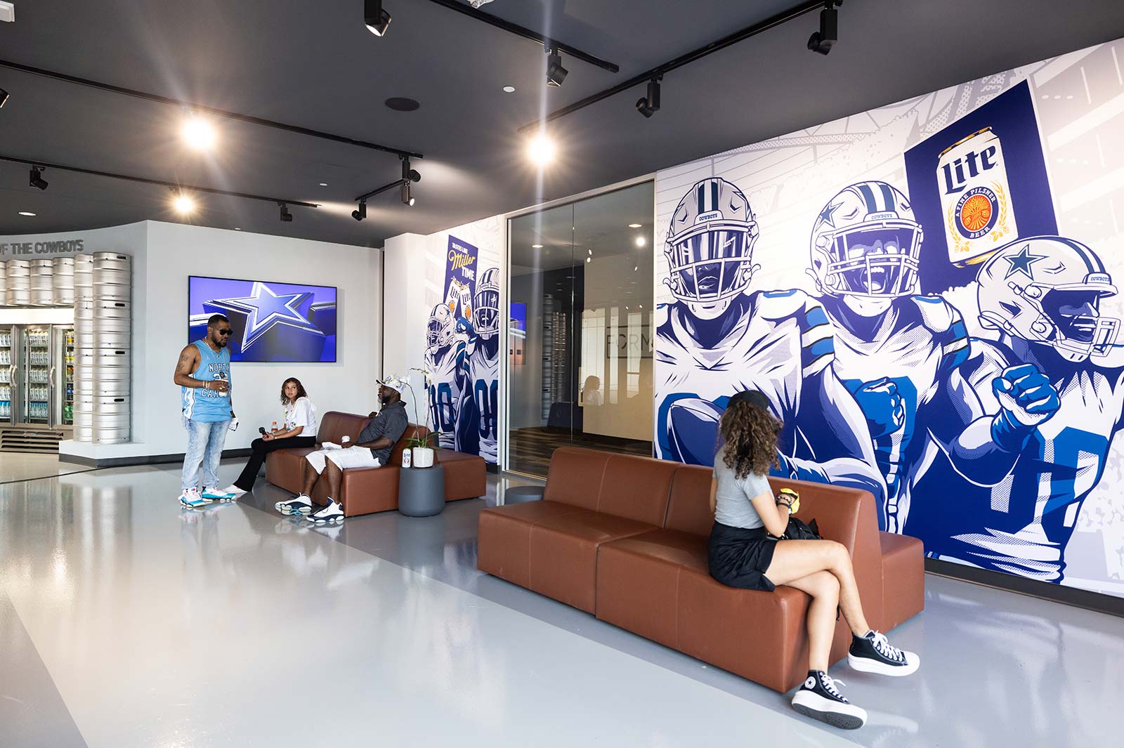 Visitors relaxing in a Cowboys themed lounge at The Star in Frisco