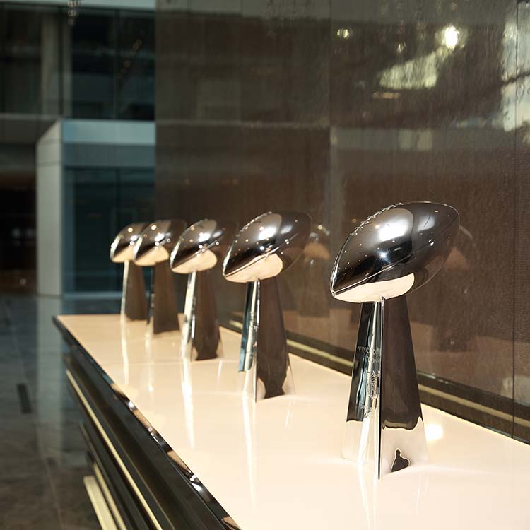 Dallas Cowboys trophies displayed inside The Star in Frisco