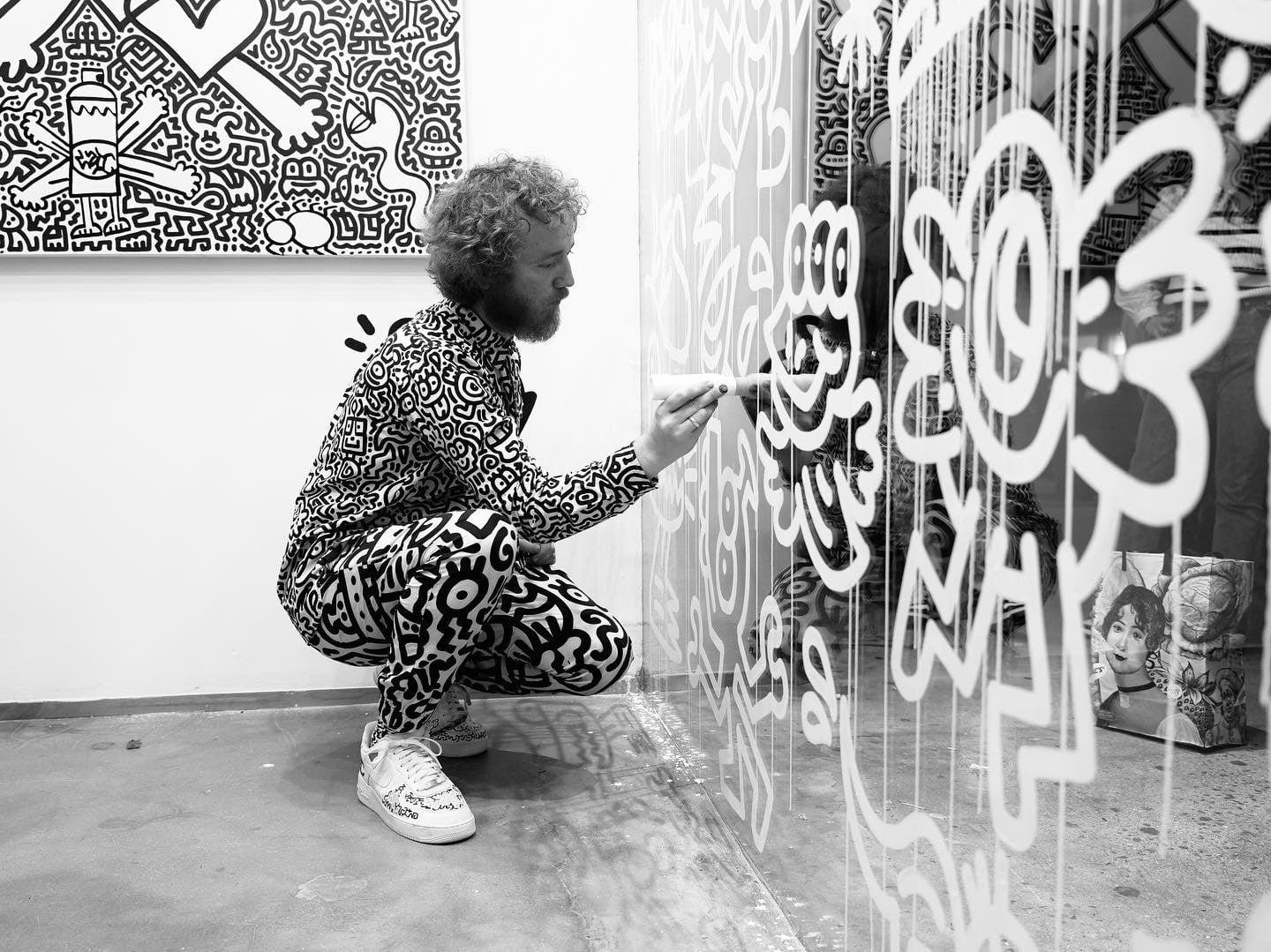 Artist painting a doodle wall at The View from The Shard