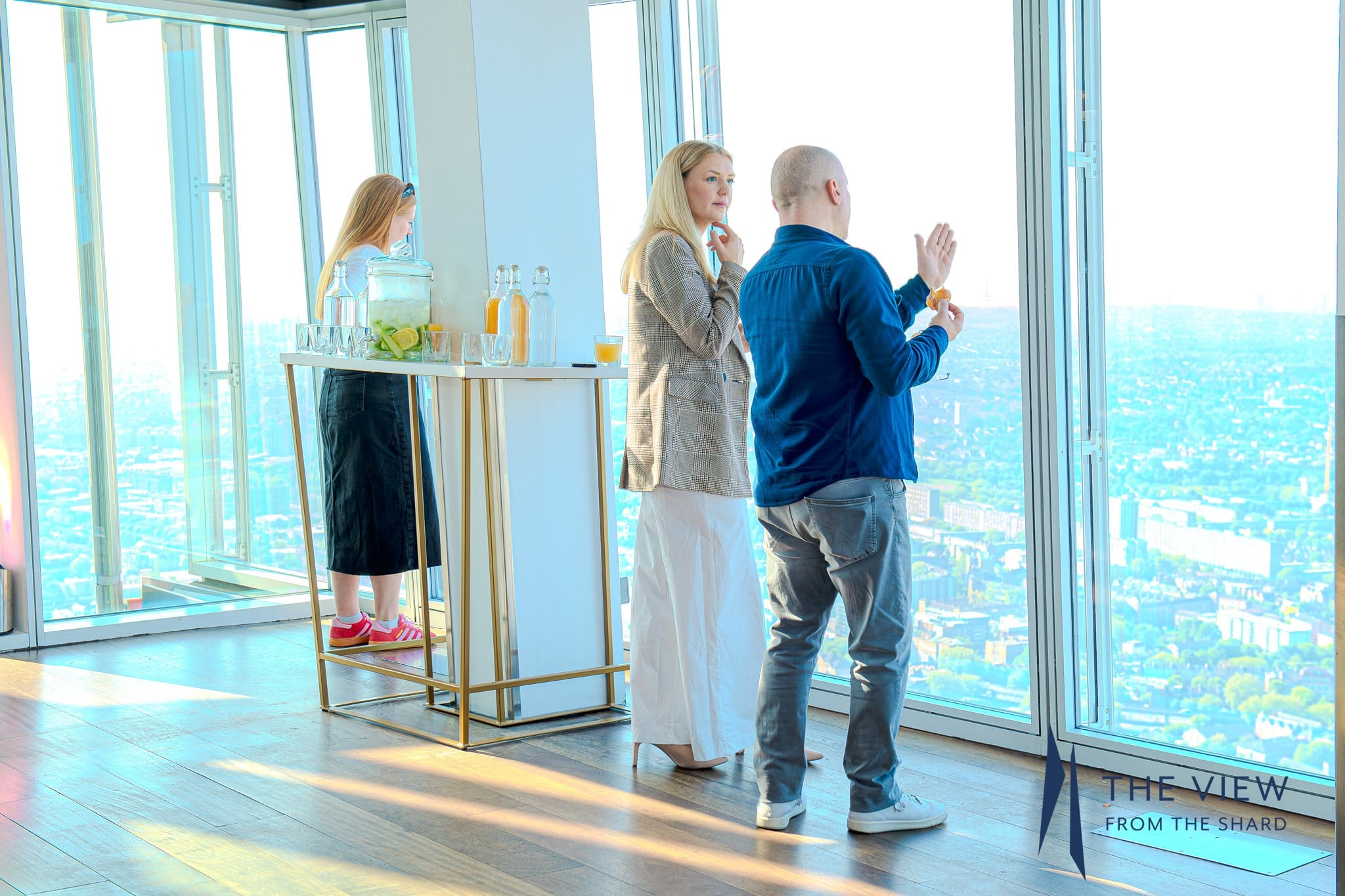 Visitors taking in London from The View from The Shard gallery