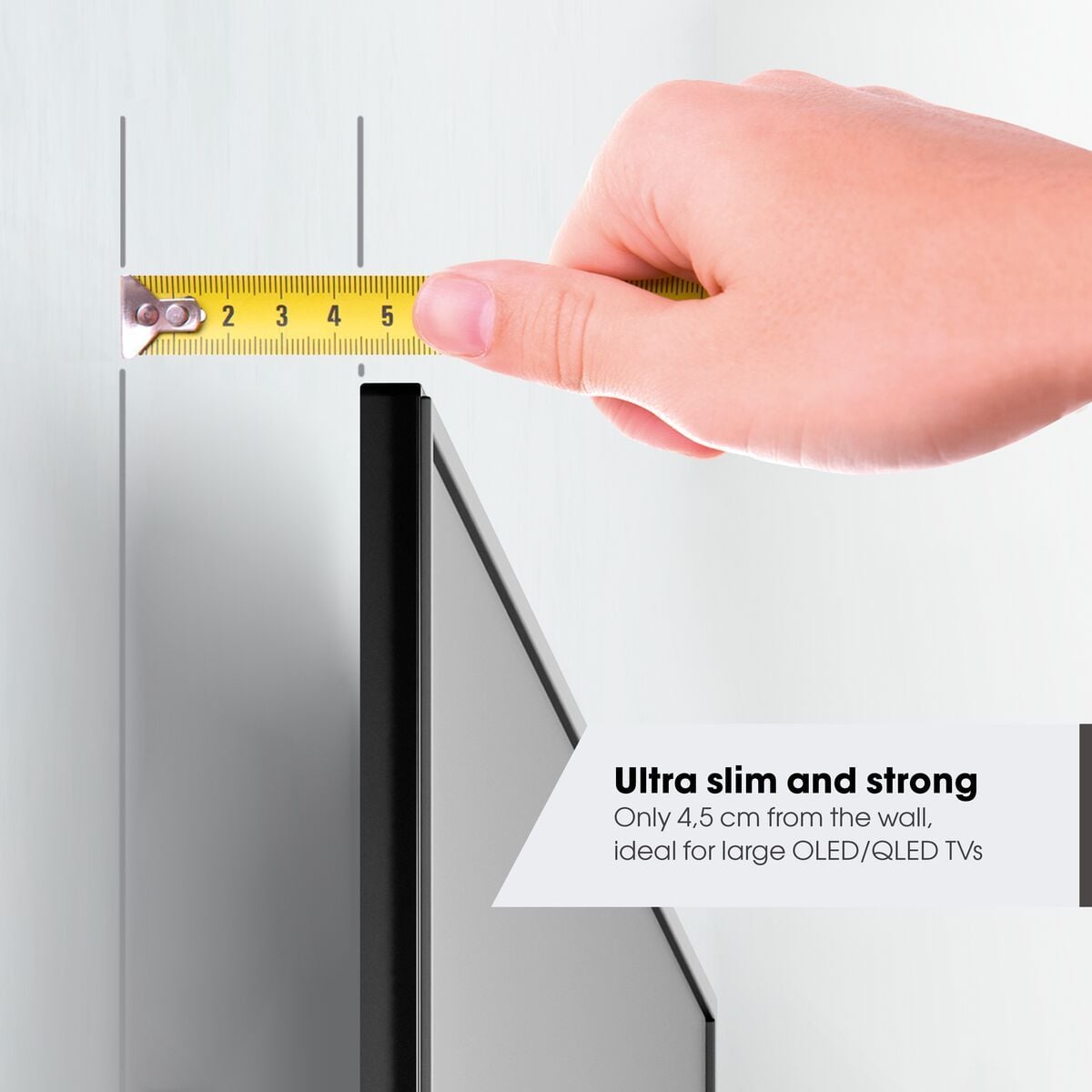 Vogel's TVM 5855 mount holding a television close to the wall