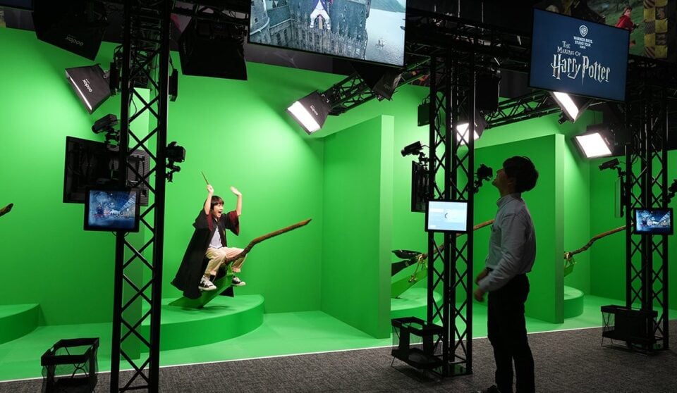 A green screen broom activity at the Studio Tour