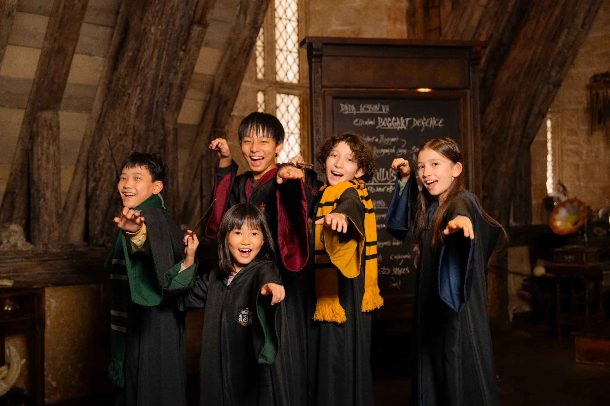 Visitors practising wand combat at Warner Bros. Studios Japan