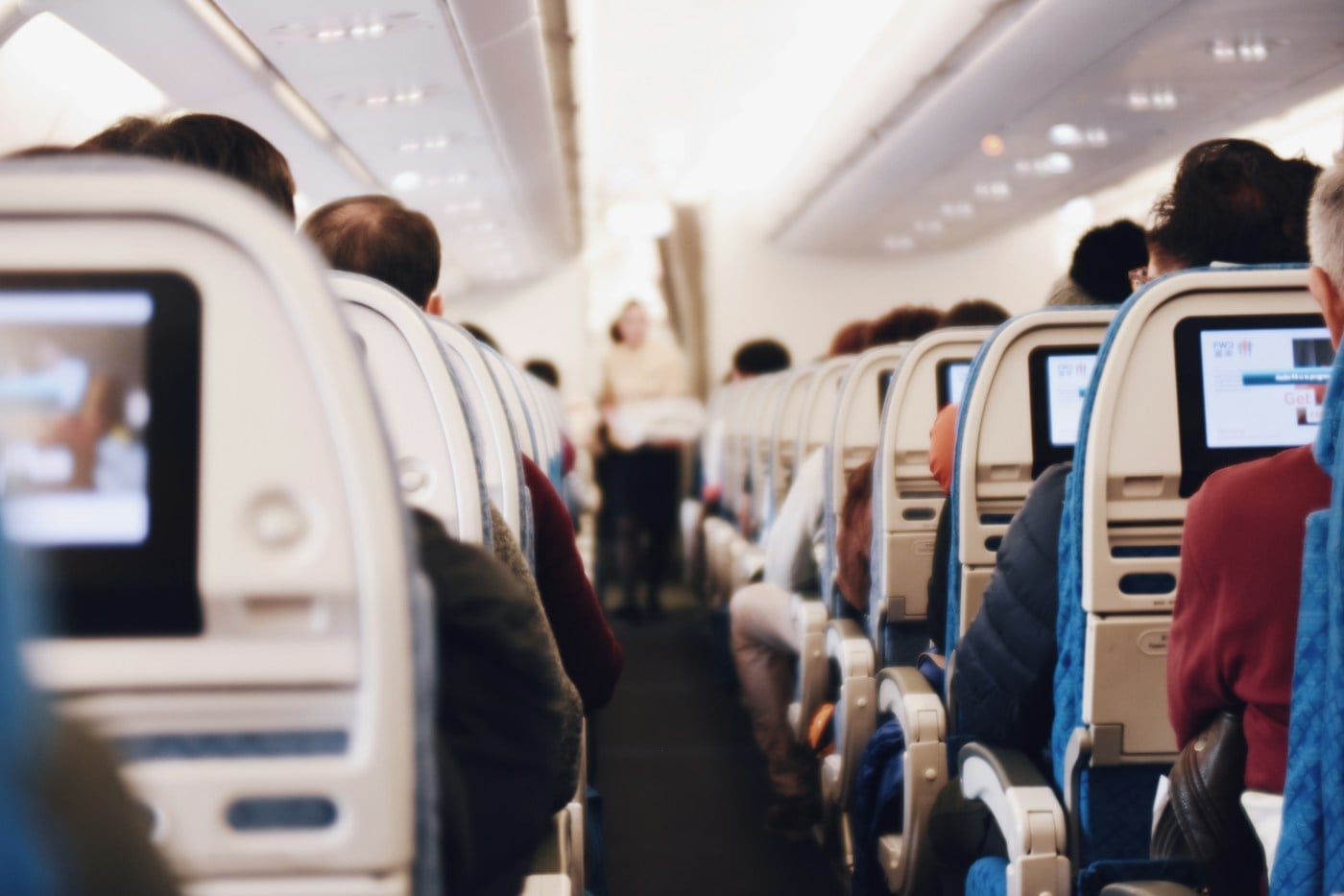 Passengers inside an airplane cabin
