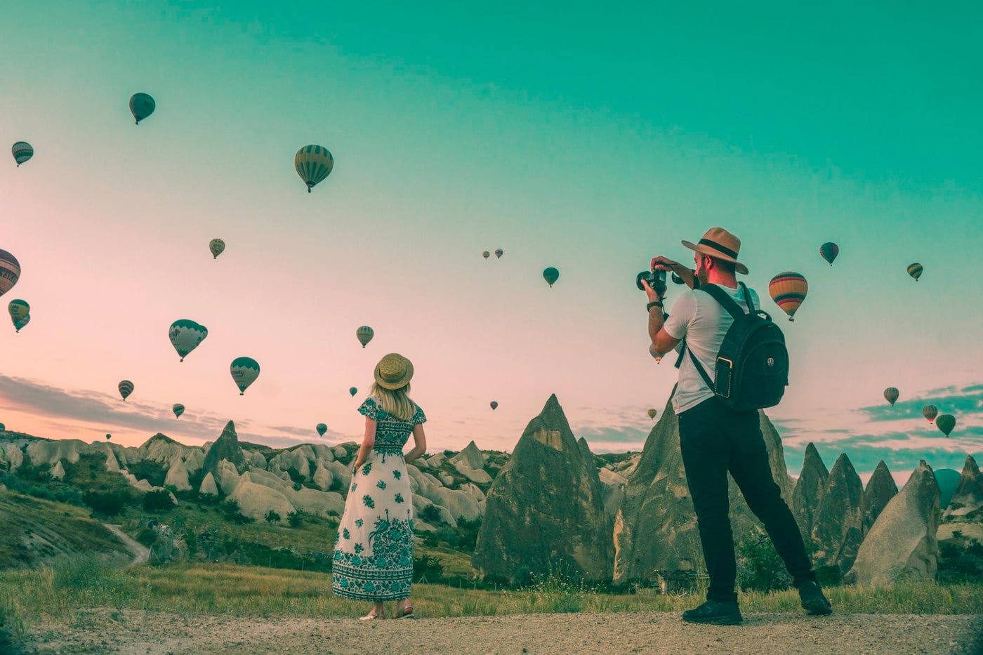 People watching hot air balloons
