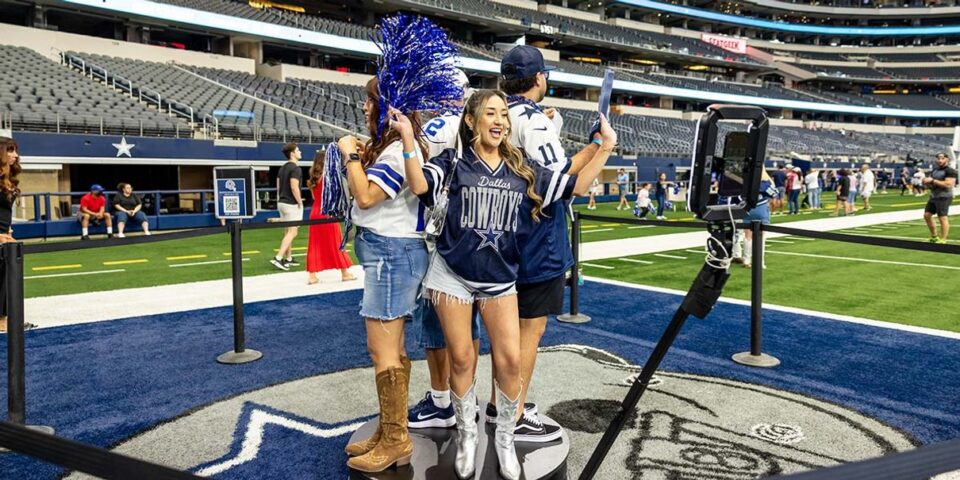Fans enjoying a Rally Day on the AT&T Stadium field