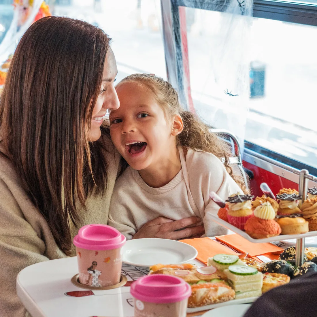 Guests on a Halloween themed London sightseeing bus experience