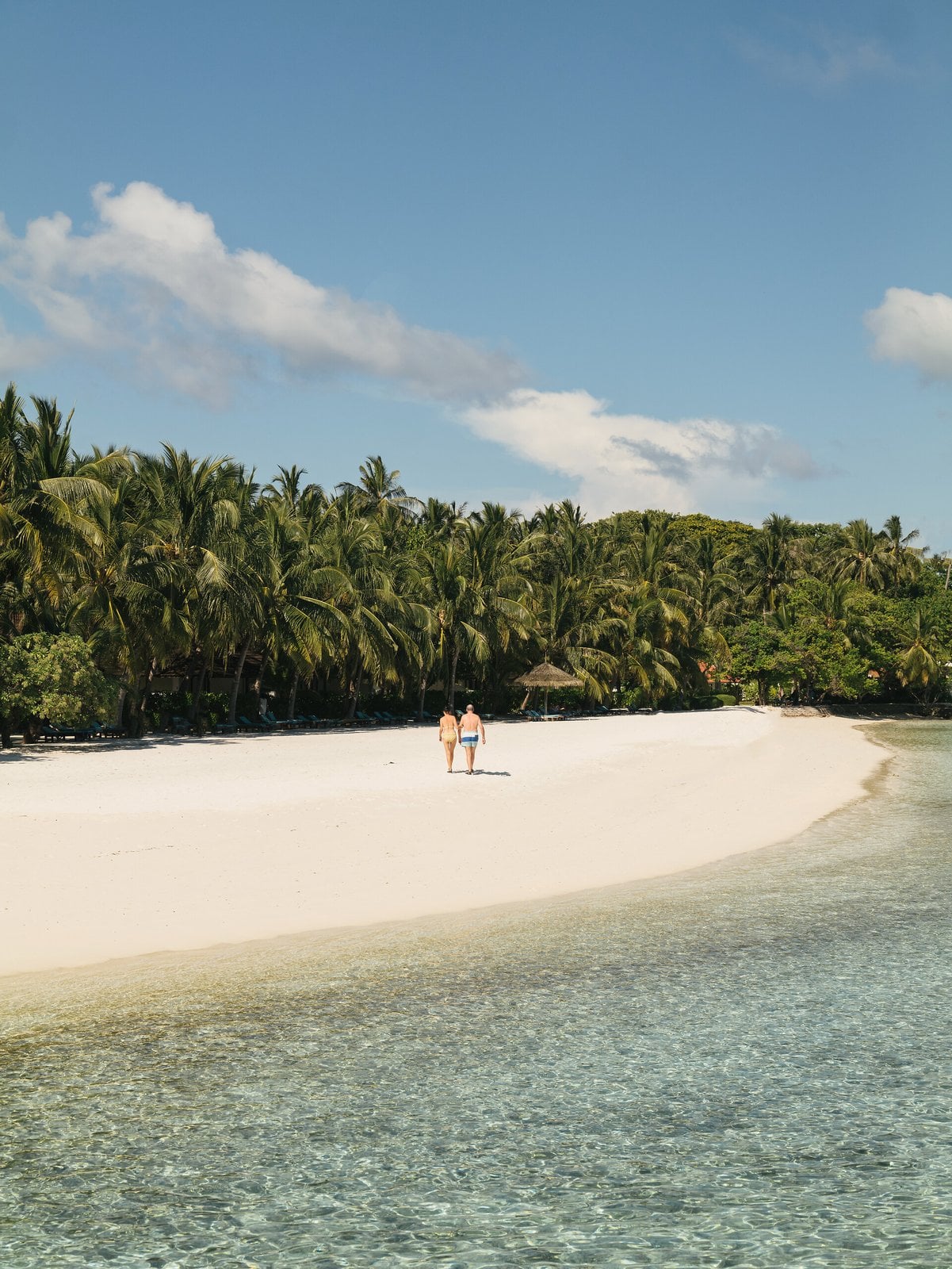 White sand and turquoise lagoon at Club Med Kani