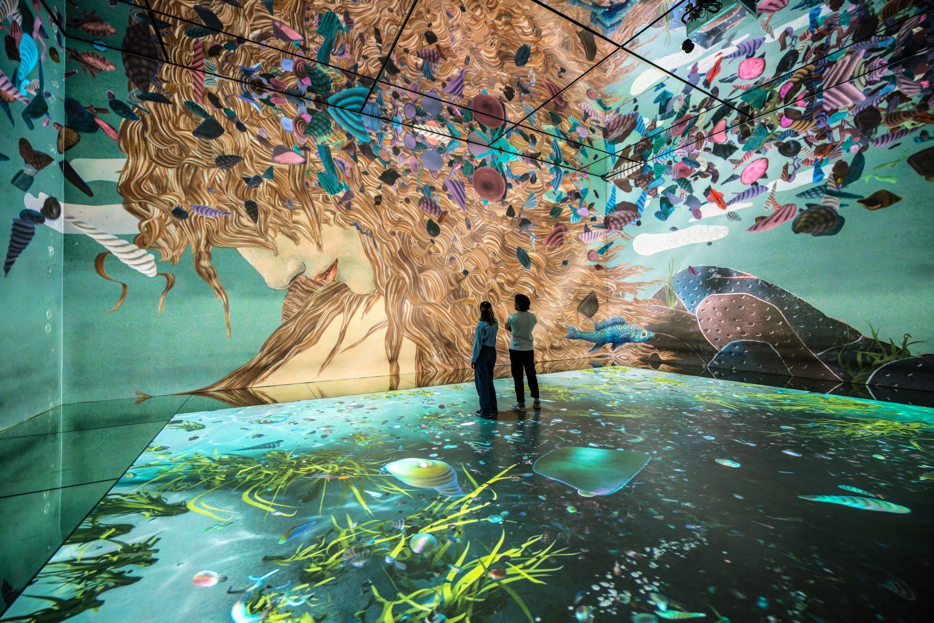 Colourful projected artwork in the Beyond Reality gallery at Frameless