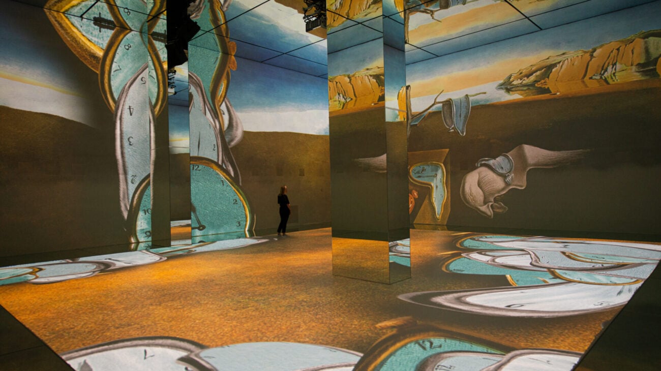 Dali-inspired projection shown in a Frameless gallery