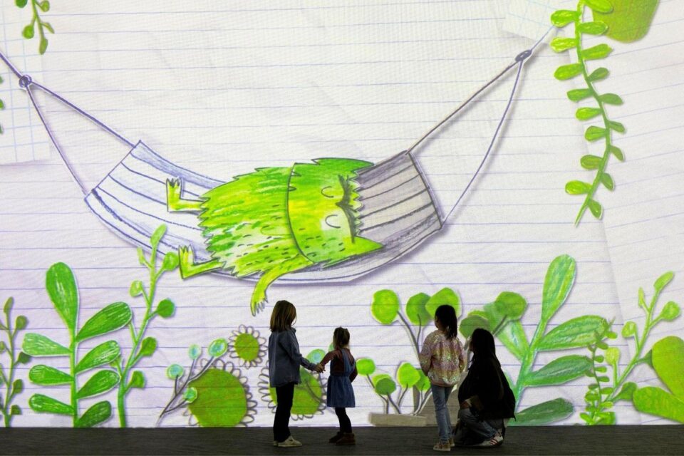 A mother and children experiencing The Colour Monster at Frameless