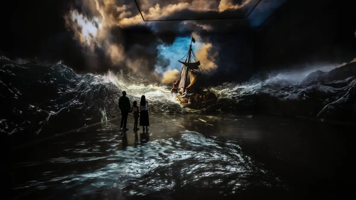 Rembrandt storm painting enlarged across an immersive gallery wall