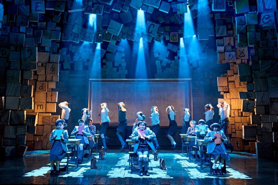 A dance scene with the company in the London production