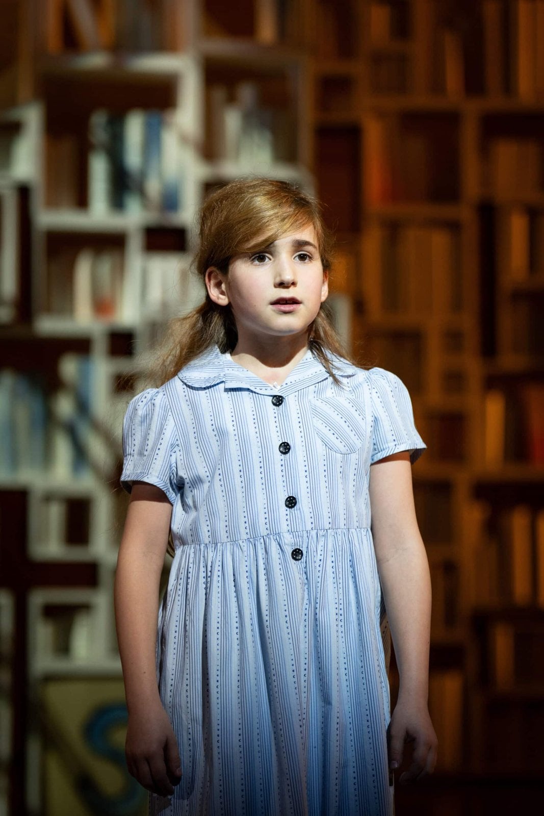 Ensemble performing in a Matilda stage scene