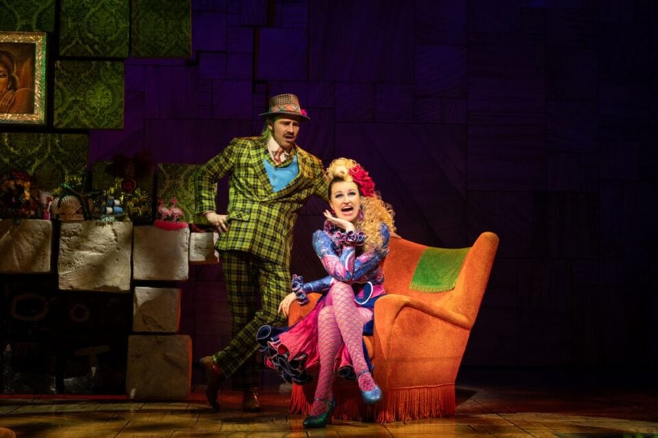 Matilda and the ensemble in a London stage scene