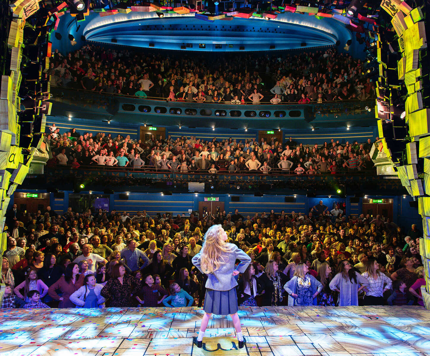 Matilda The Musical company posing together after the Olivier Awards
