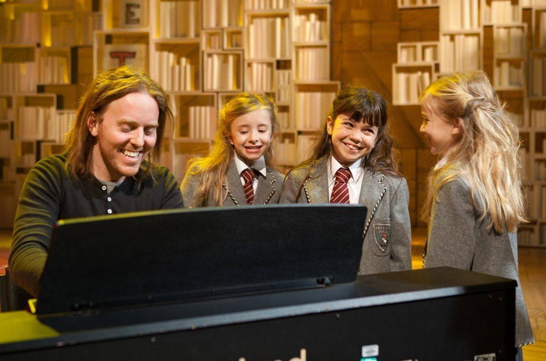 Matilda cast members in an offstage group photograph