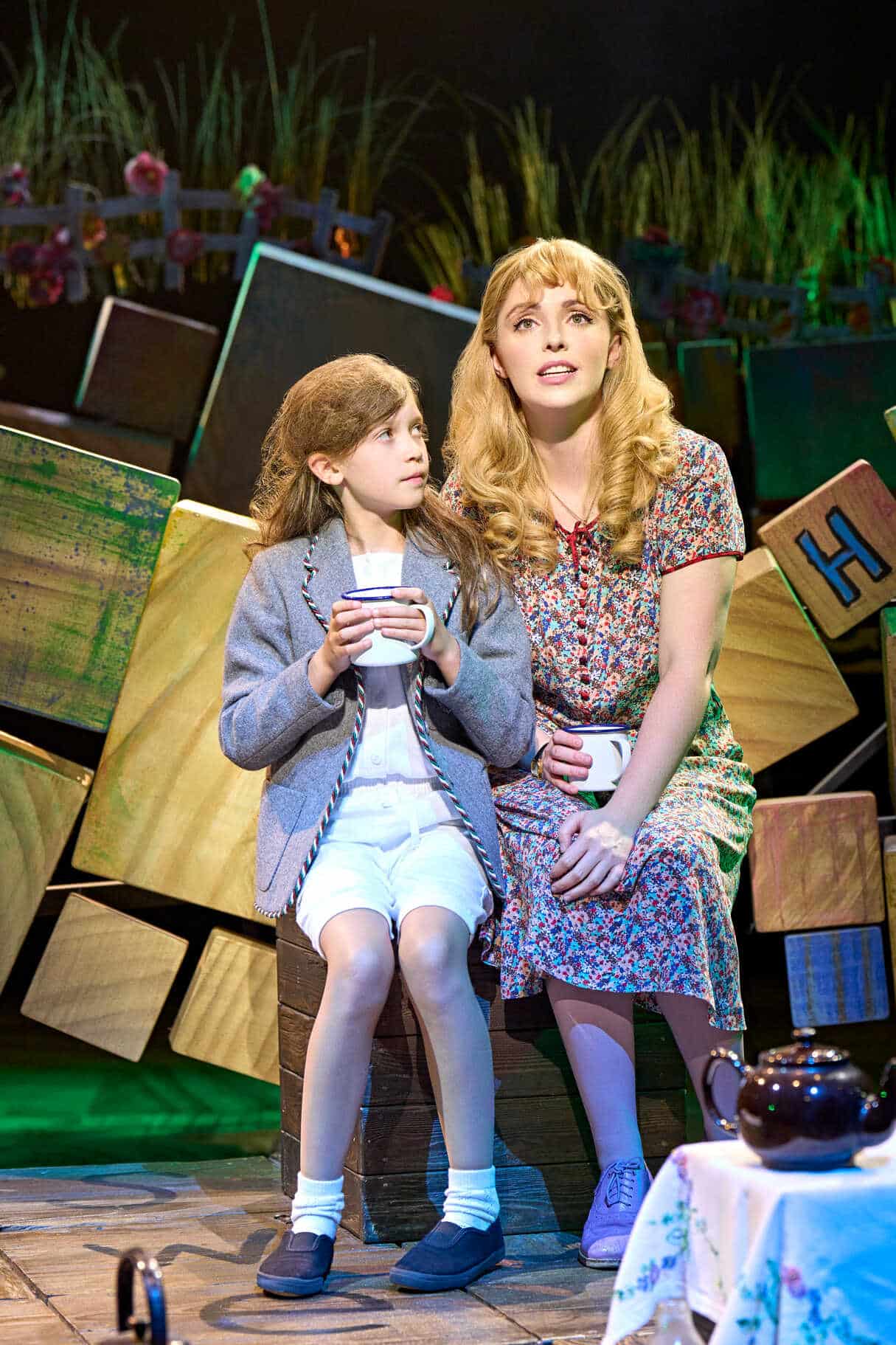 Performers in a Matilda musical scene