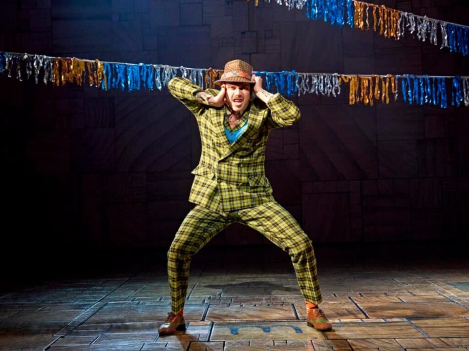 Matilda and the company in a London stage scene