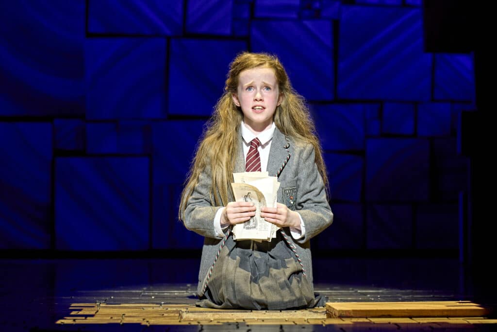 Matilda and the company in a UK tour scene