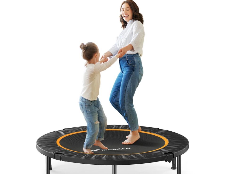 Two people exercising on a Merach fitness trampoline