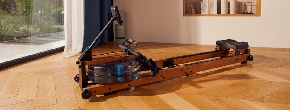 Merach R28R1 water rowing machine in a home fitness scene