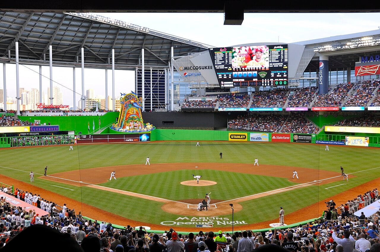 Baseball action during a Miami Marlins first pitch