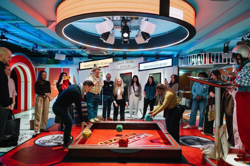 A group playing together at Monopoly Lifesized